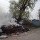 Фото читателя . Мусор горит, кругом невыносимый запах